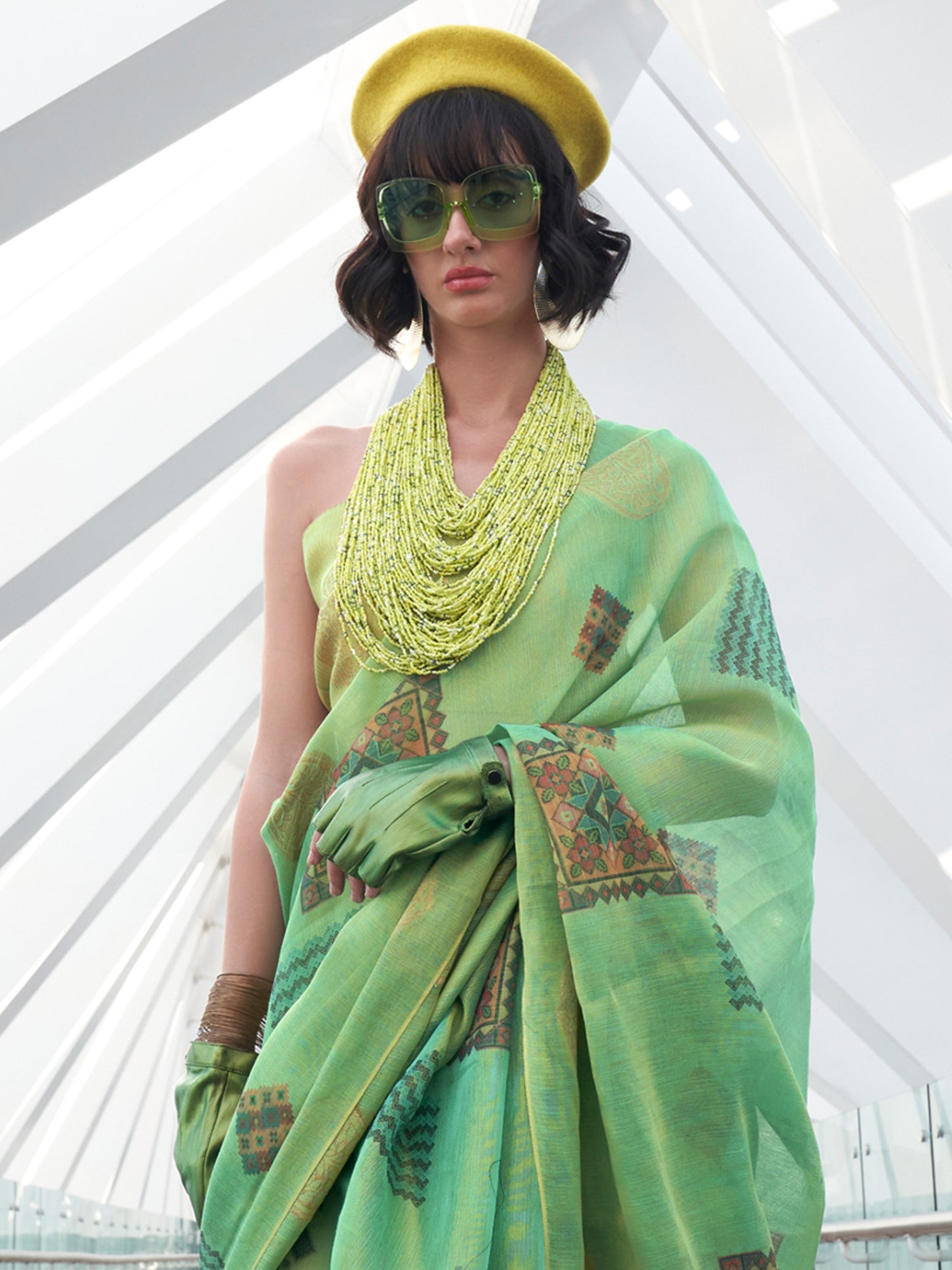Women's Tissue Sea Green Woven Design Designer Saree With Blouse Piece