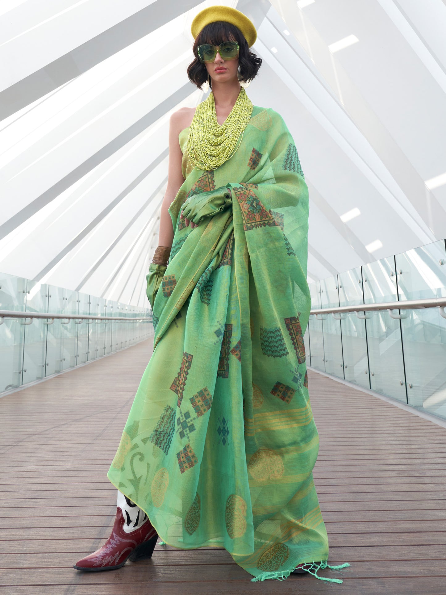 Women's Tissue Sea Green Woven Design Designer Saree With Blouse Piece