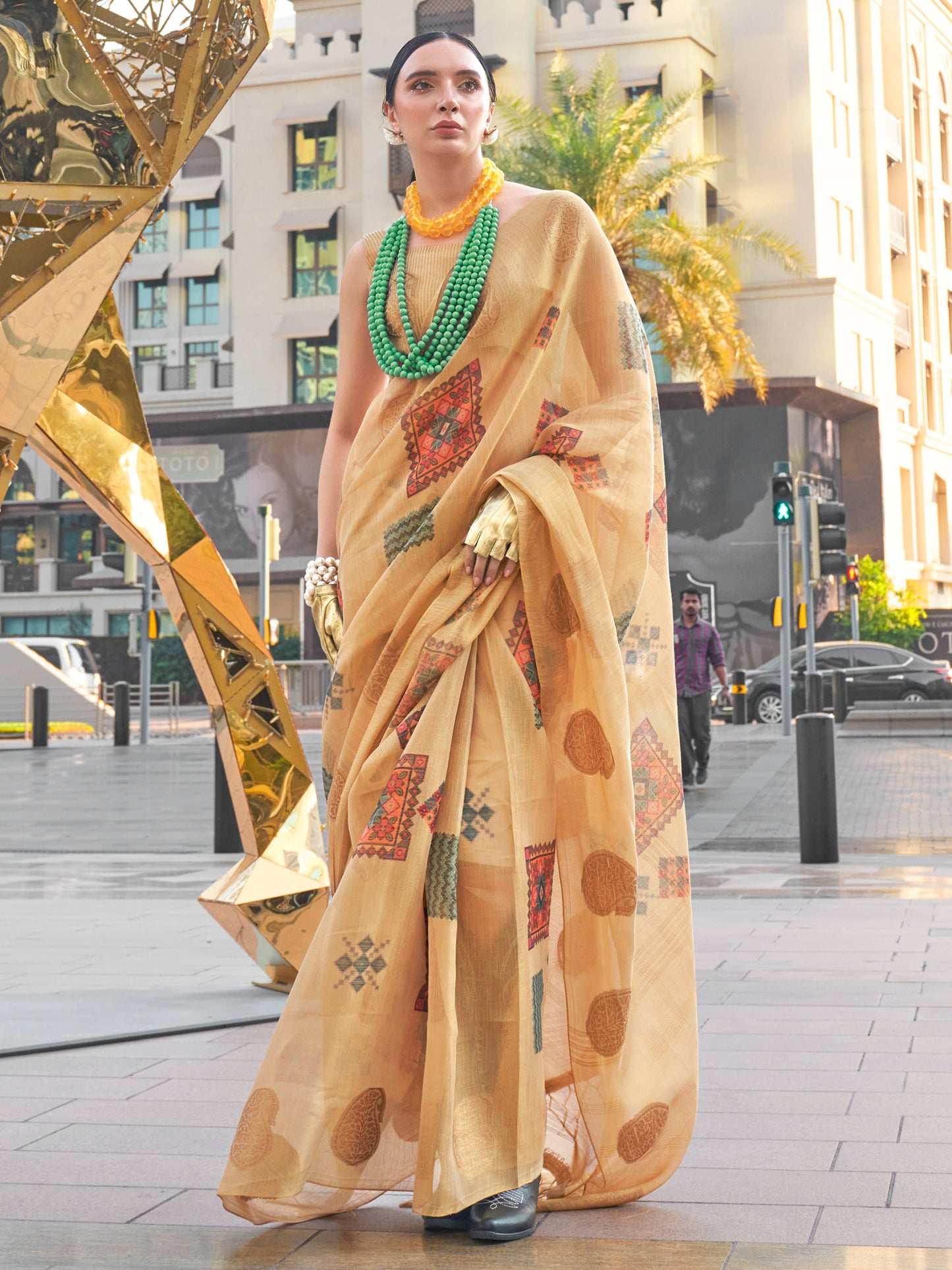 Women's Tissue Beige Woven Design Designer Saree With Blouse Piece