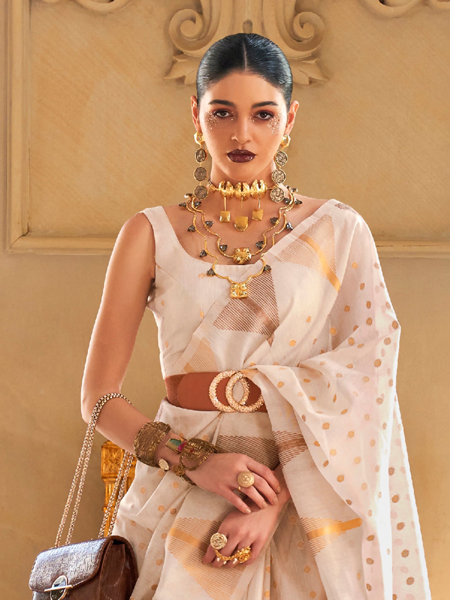 Women's Tissue Cream Woven Design Designer Saree With Blouse Piece