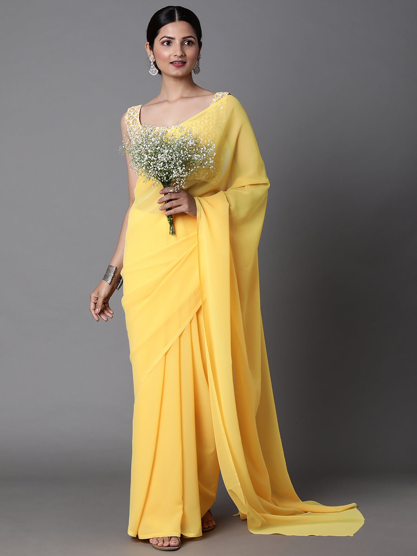 Women's Georgette Yellow Embellished Celebrity Saree With Blouse Piece