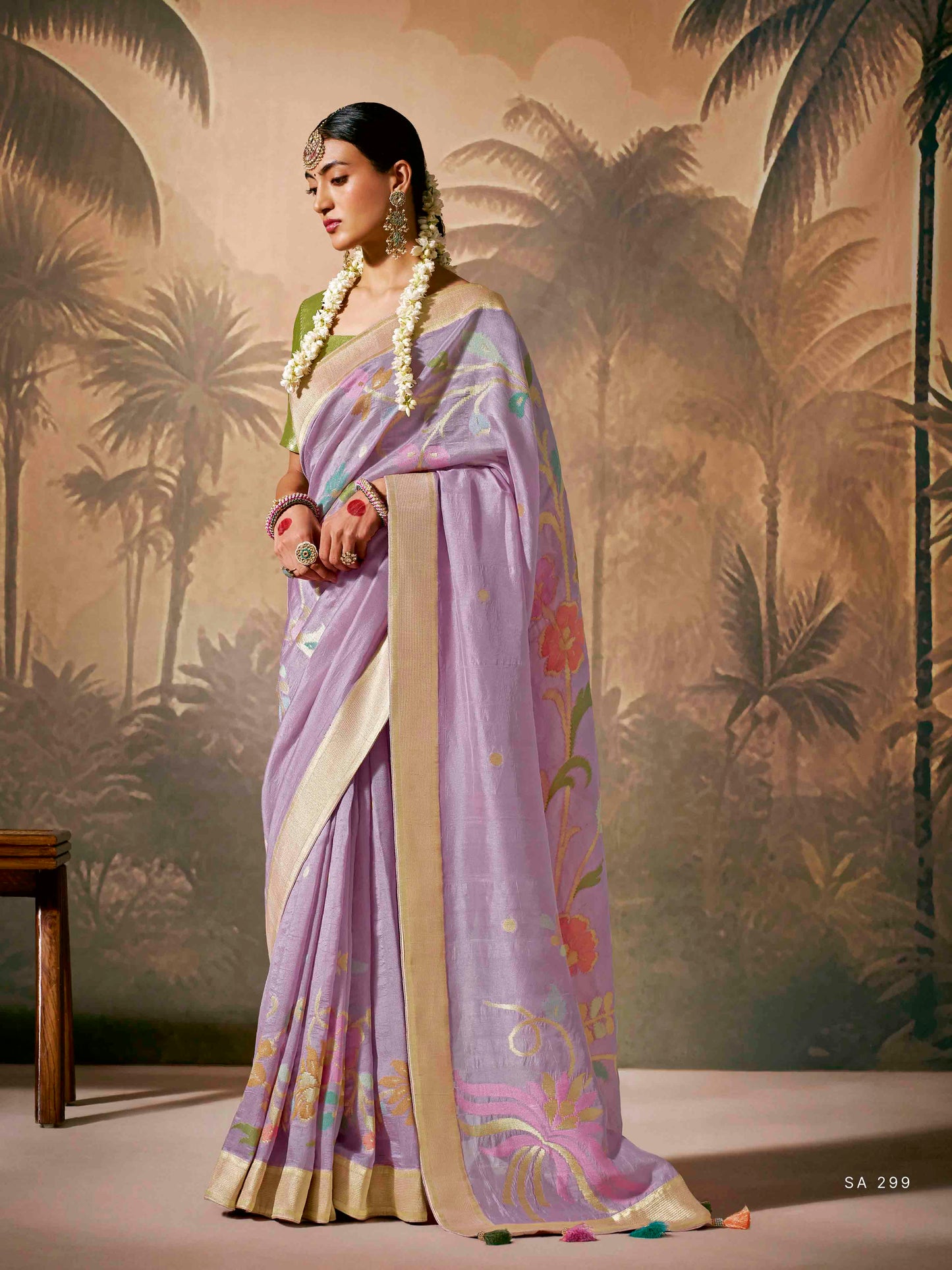 Dhiyona KM Women Royal Purple Silk Saree With Stunning Contrast Green Blouse