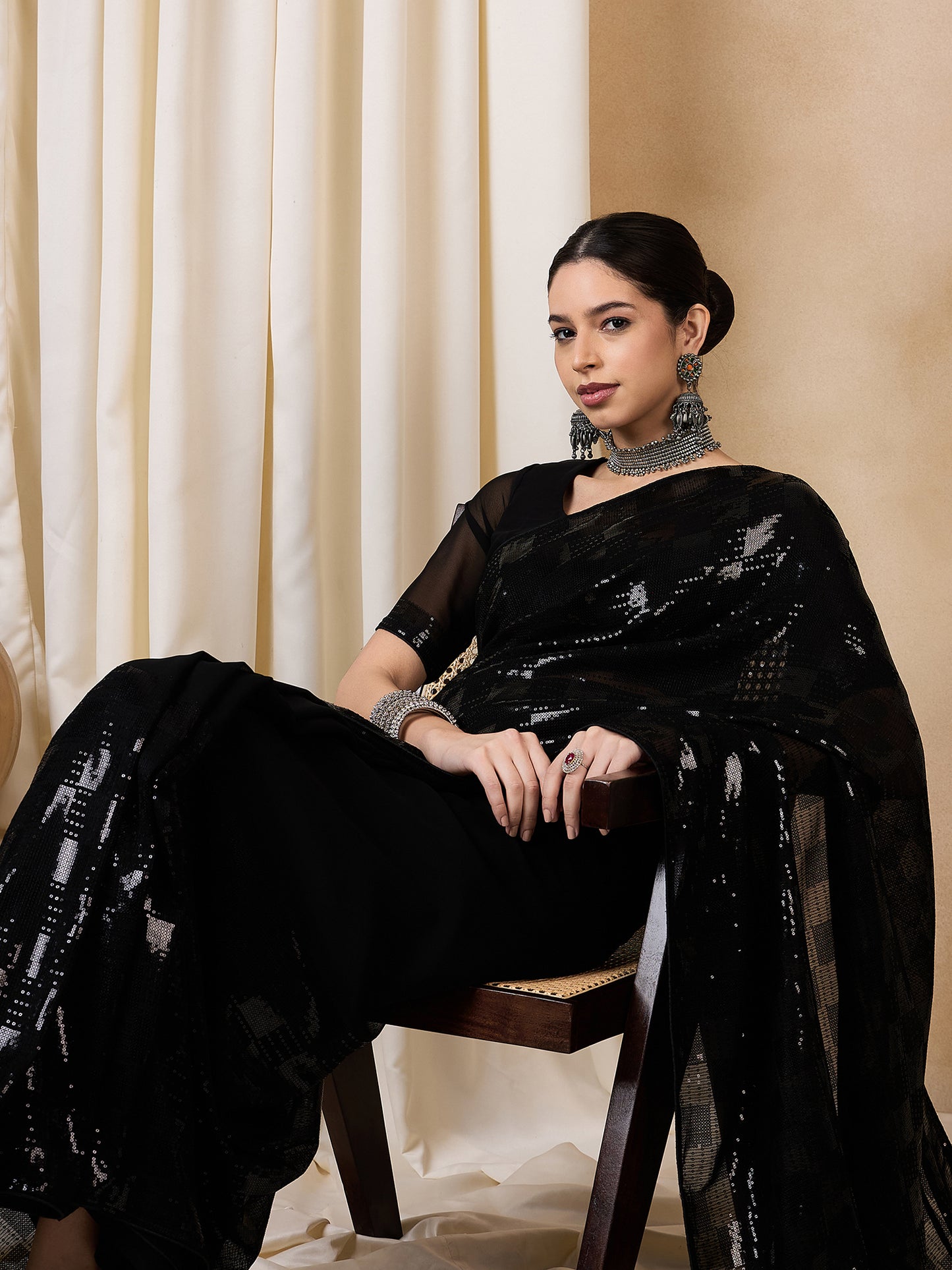 Dhiyona RV Women's Elegant Black Sequins Embroidered Georgette Saree with Matching Blouse ( KVD2110 )
