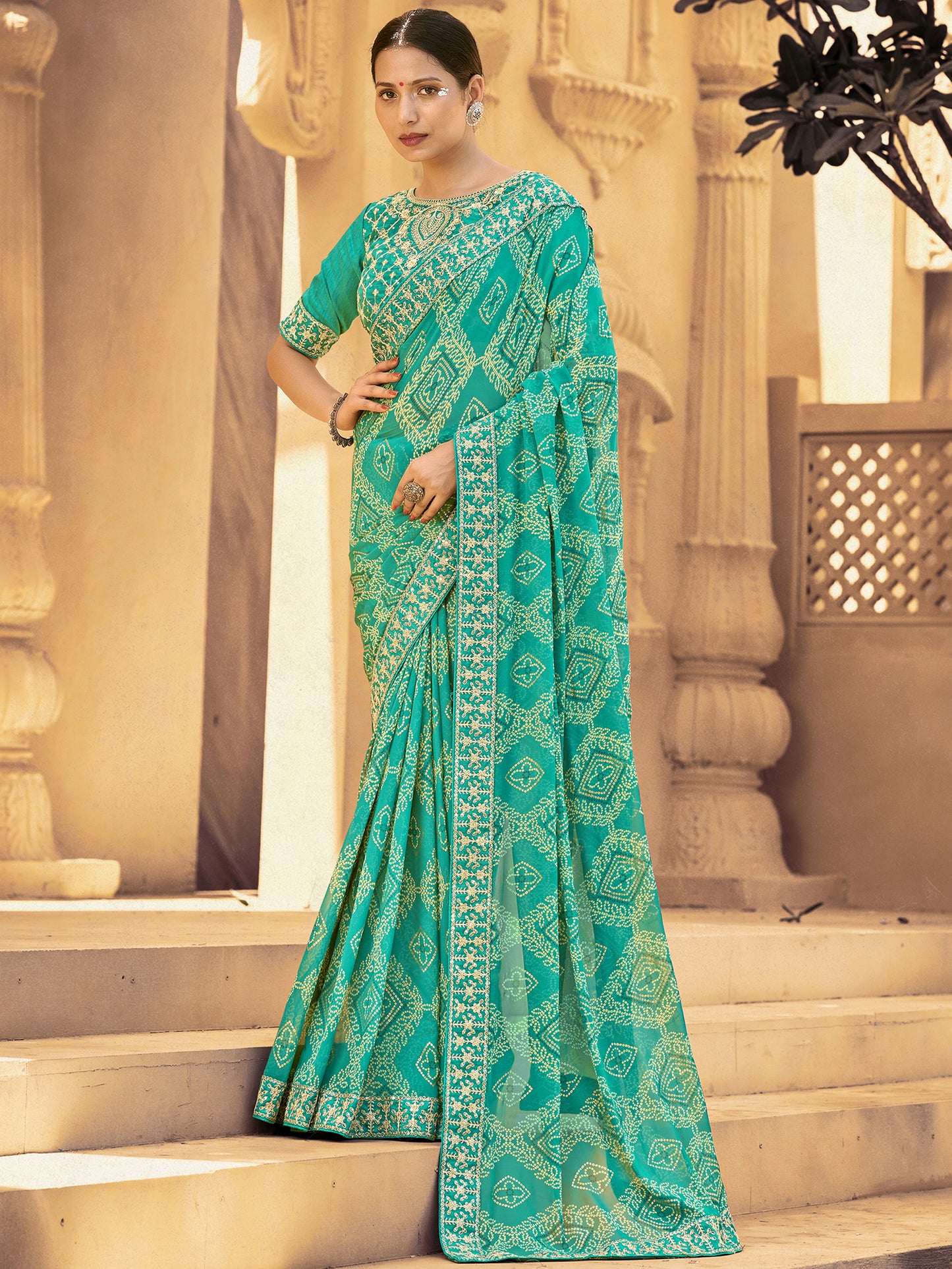 Women's Georgette Turquoise Embellished Designer Saree With Blouse Piece