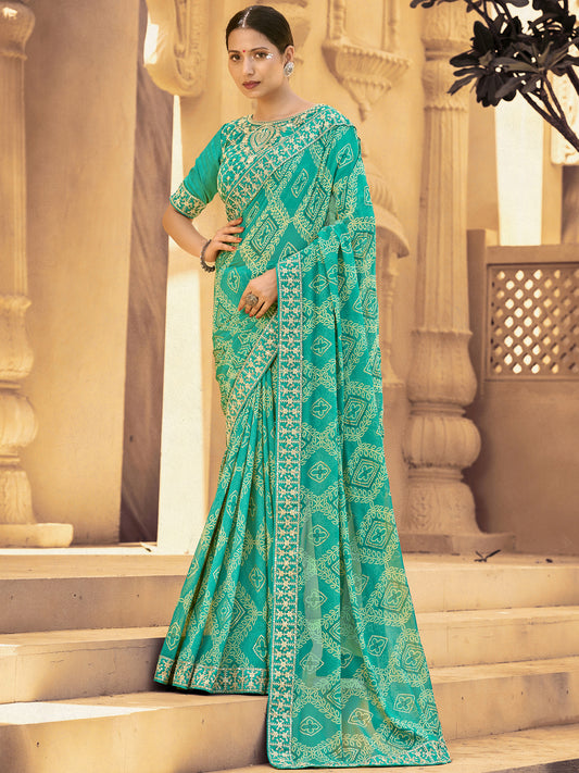 Women's Georgette Turquoise Embellished Designer Saree With Blouse Piece