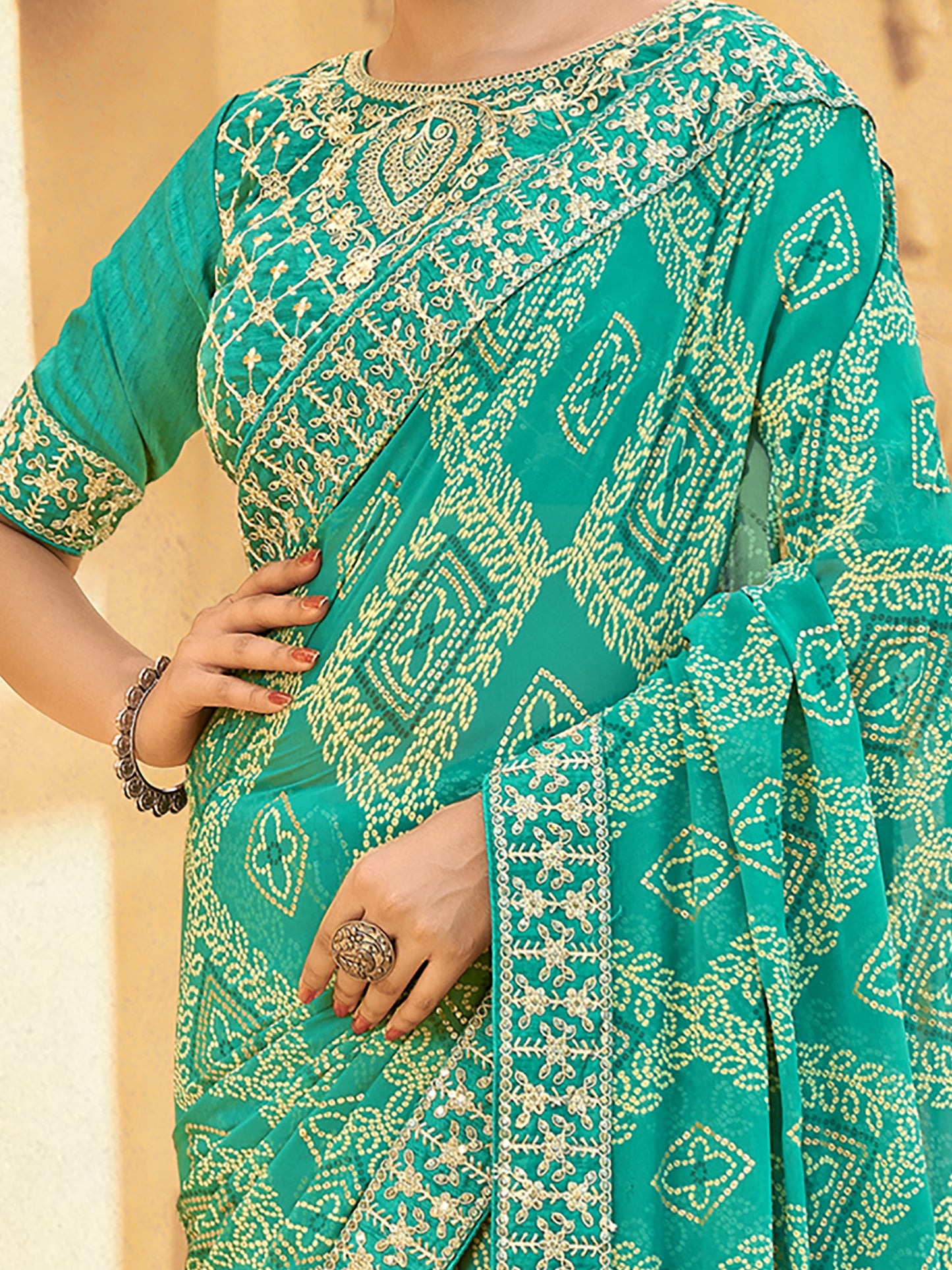 Women's Georgette Turquoise Embellished Designer Saree With Blouse Piece