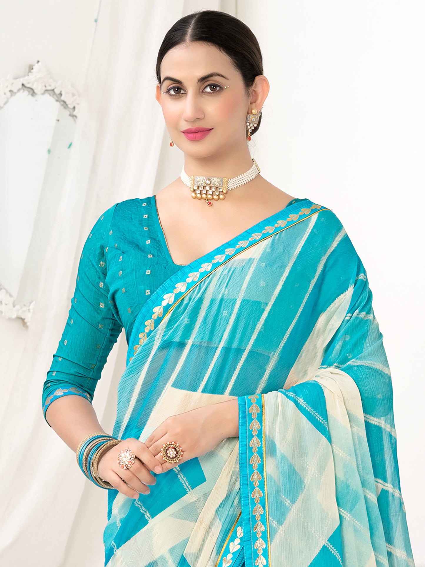 Women's Chiffon Blue Embellished Designer Saree With Blouse Piece