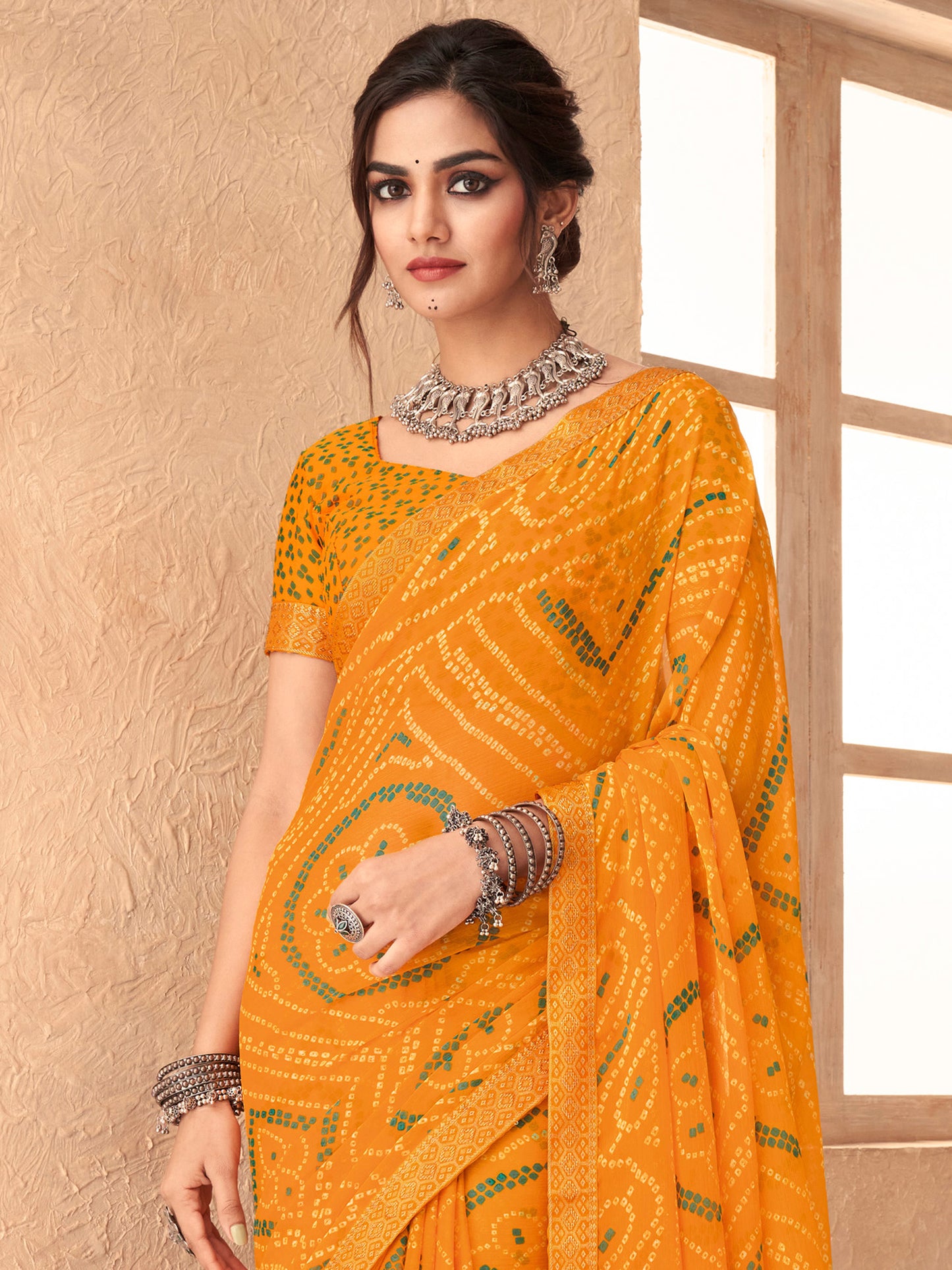 Women's Chiffon Yellow Embellished Designer Saree With Blouse Piece