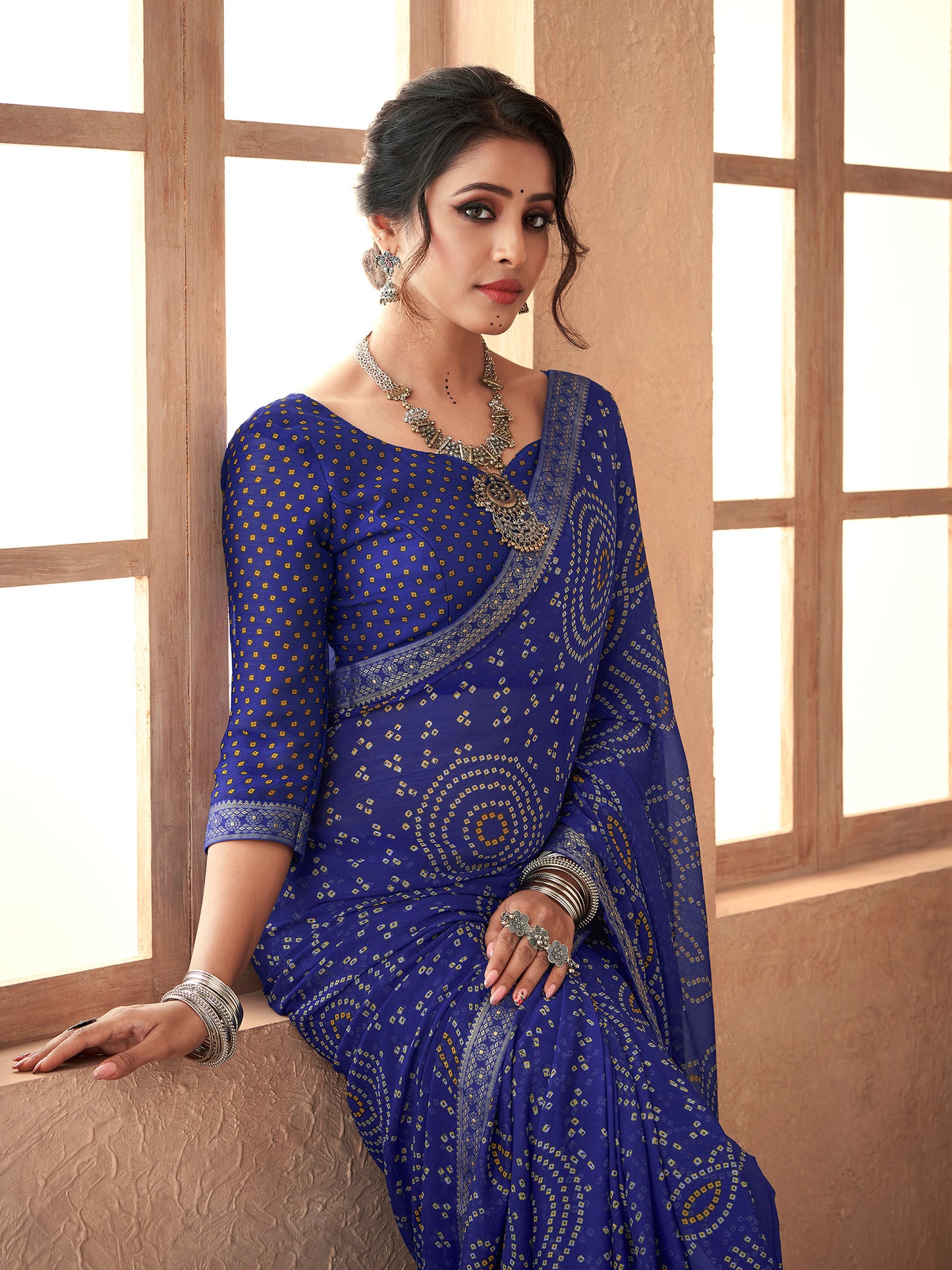 Women's Chiffon Blue Embellished Designer Saree With Blouse Piece