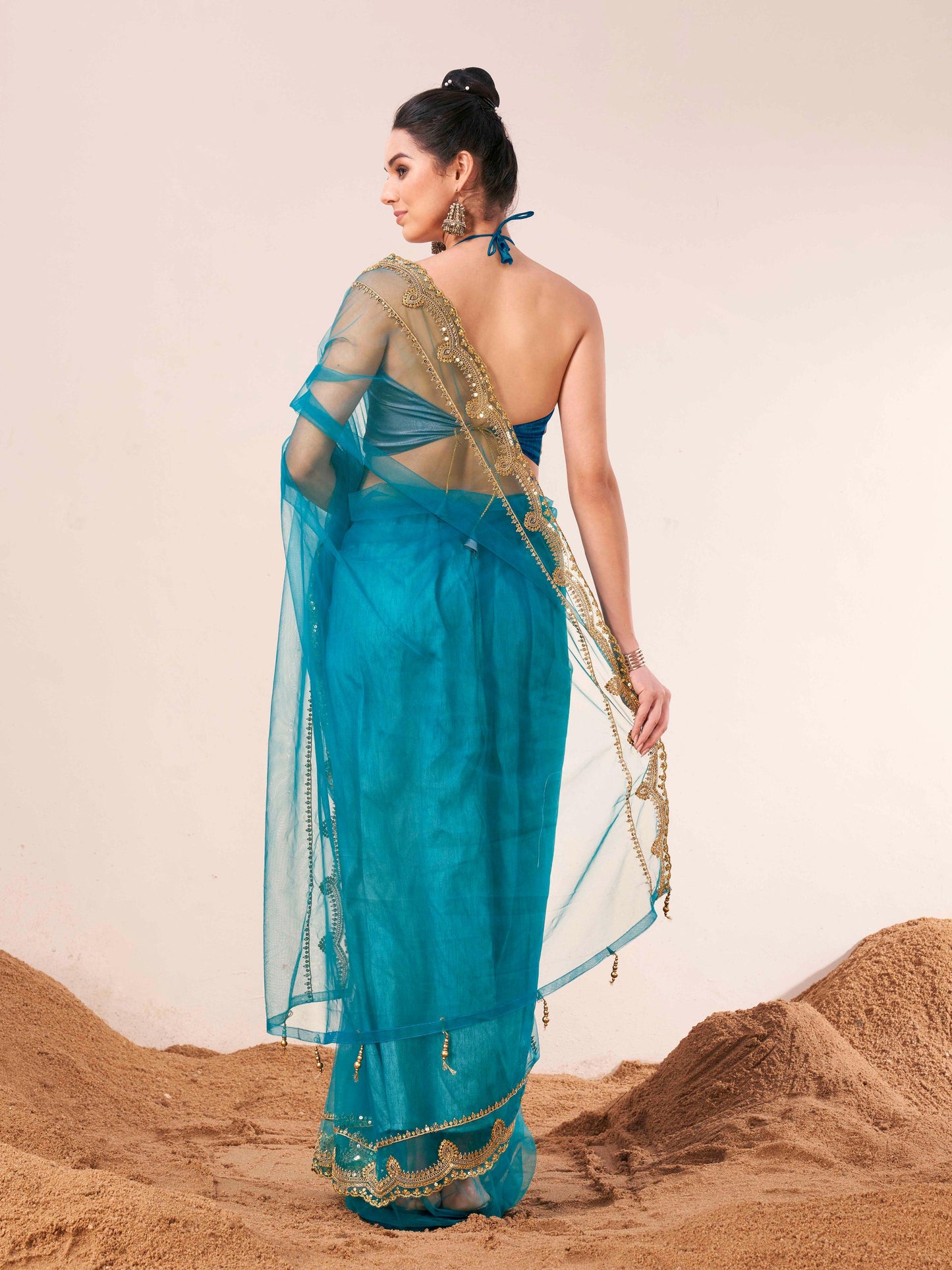 Dhiyona TI Women's Firozi Colored Net Embellished Saree with Unstitched Blouse
