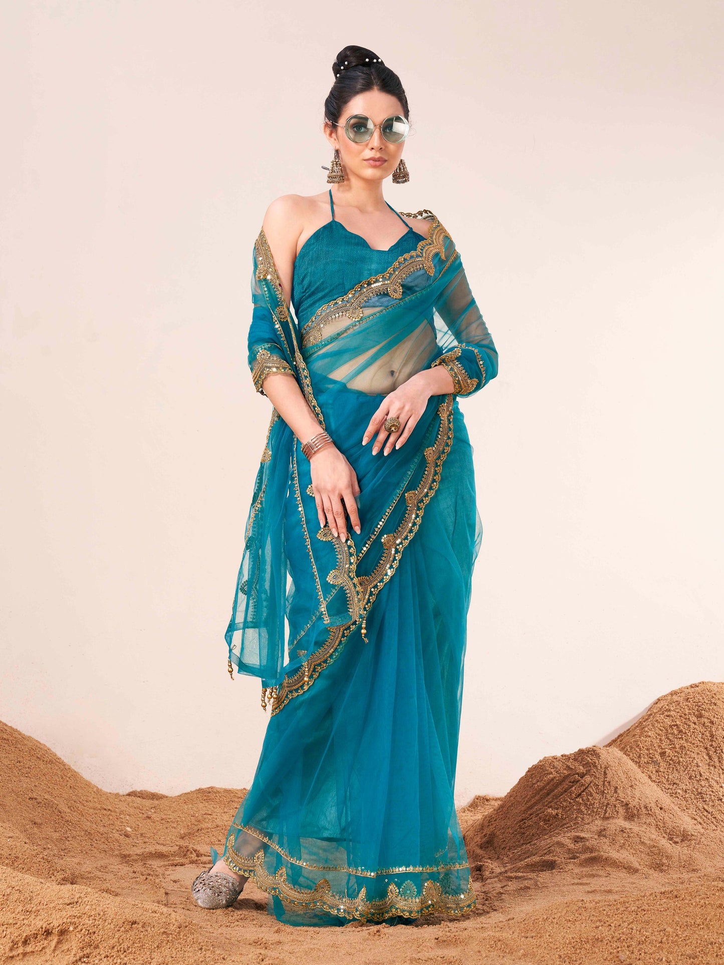 Dhiyona TI Women's Firozi Colored Net Embellished Saree with Unstitched Blouse