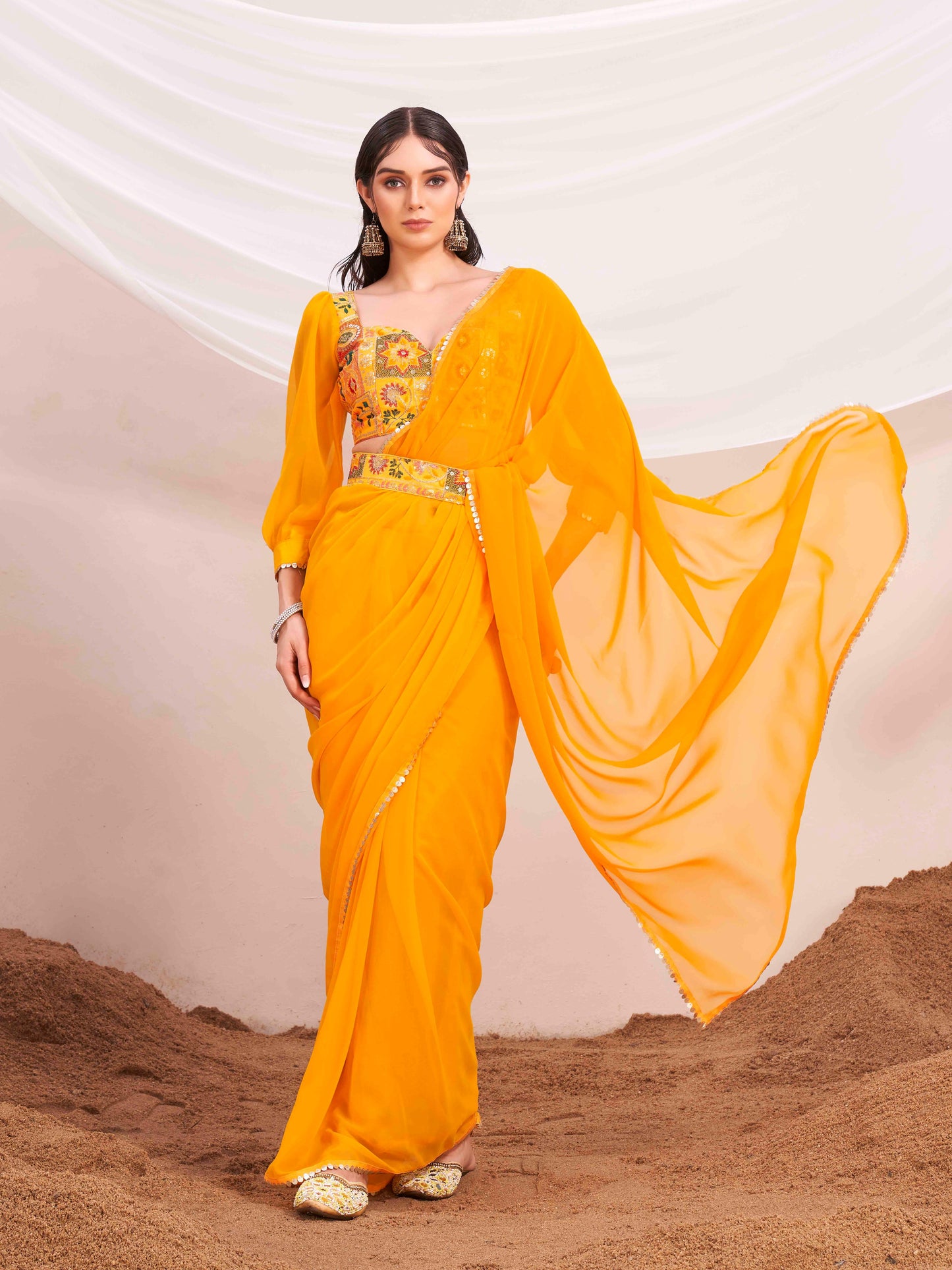Dhiyona TI Women's Yellow Colored Poly Georgette Saree with Unstitched Blouse and Belt