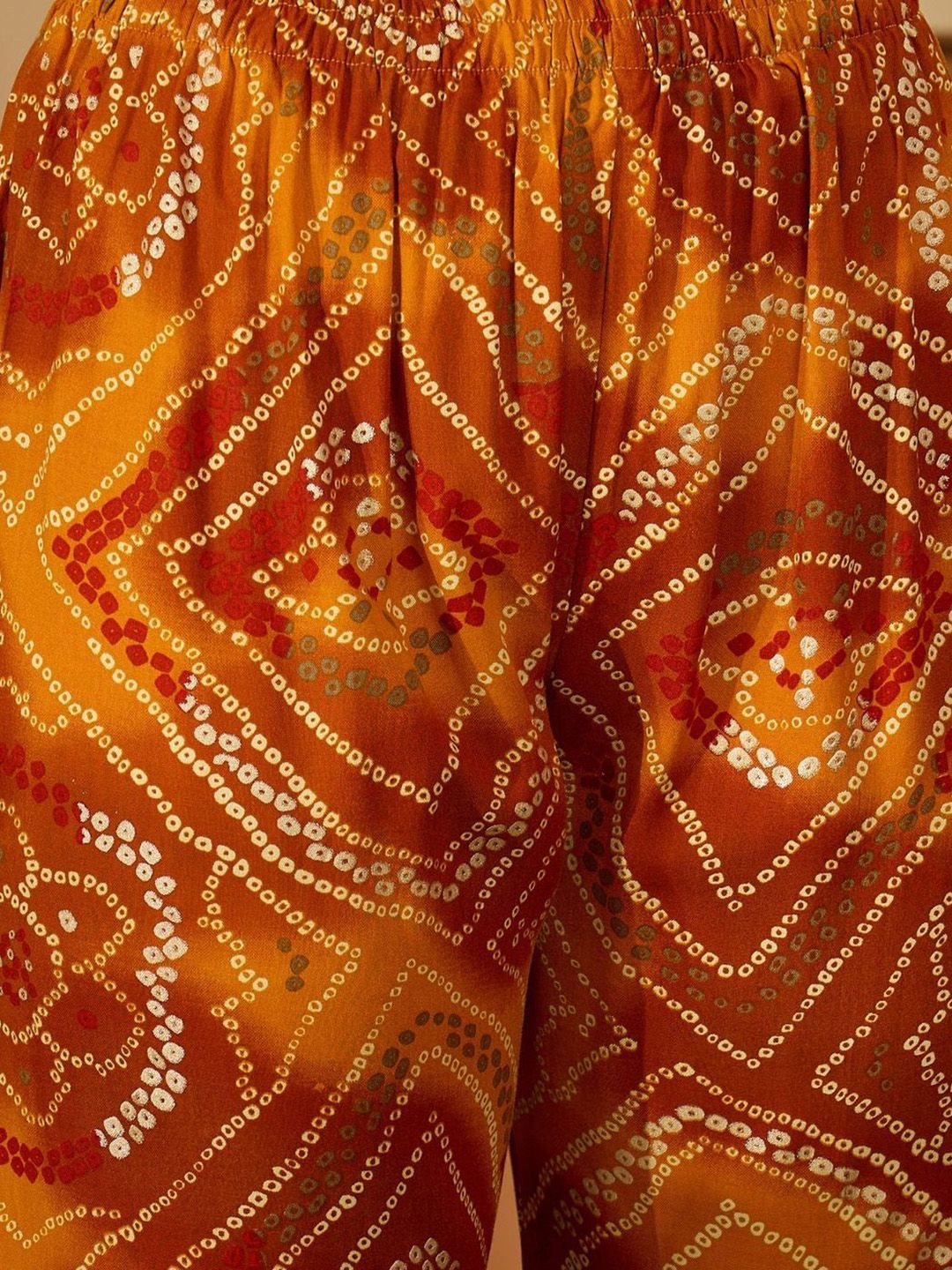 Dhiyona SN Women's Bandhani Printed Sequinned A-Line Kurta With Trousers & Dupatta