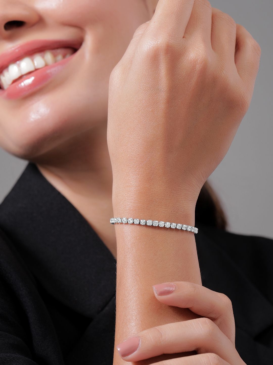 Dhiyona RJ Women's Rhodium Plated Cubic Zirconia Studded Tennis Bracelet