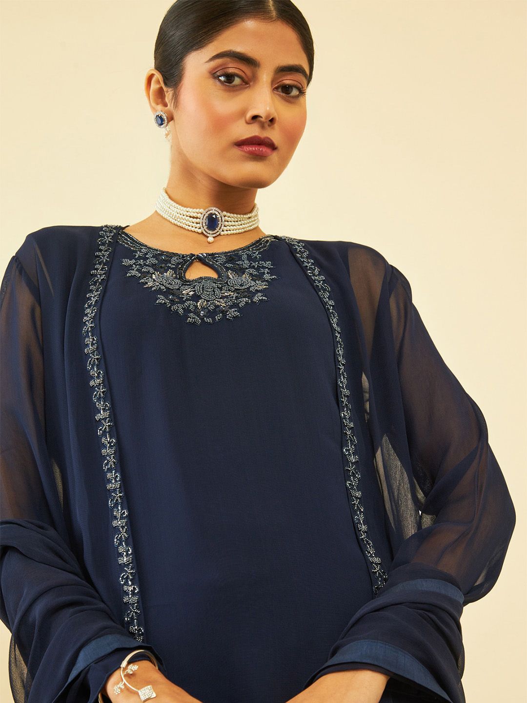 Dhiyona SO Women's Blue Yoke Design Keyhole Neck Bead Georgette Kurta with Churidar & Dupatta with Shrug