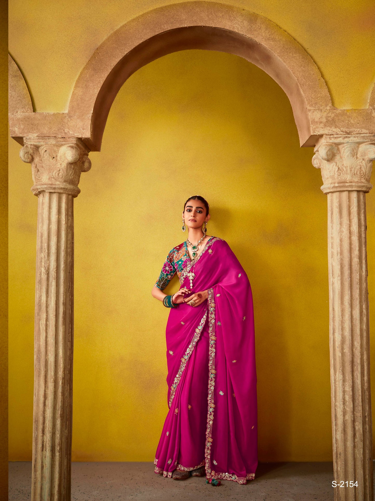 Dhiyona KM Women Regal Magenta Elegance: A Timeless Saree Of Opulence