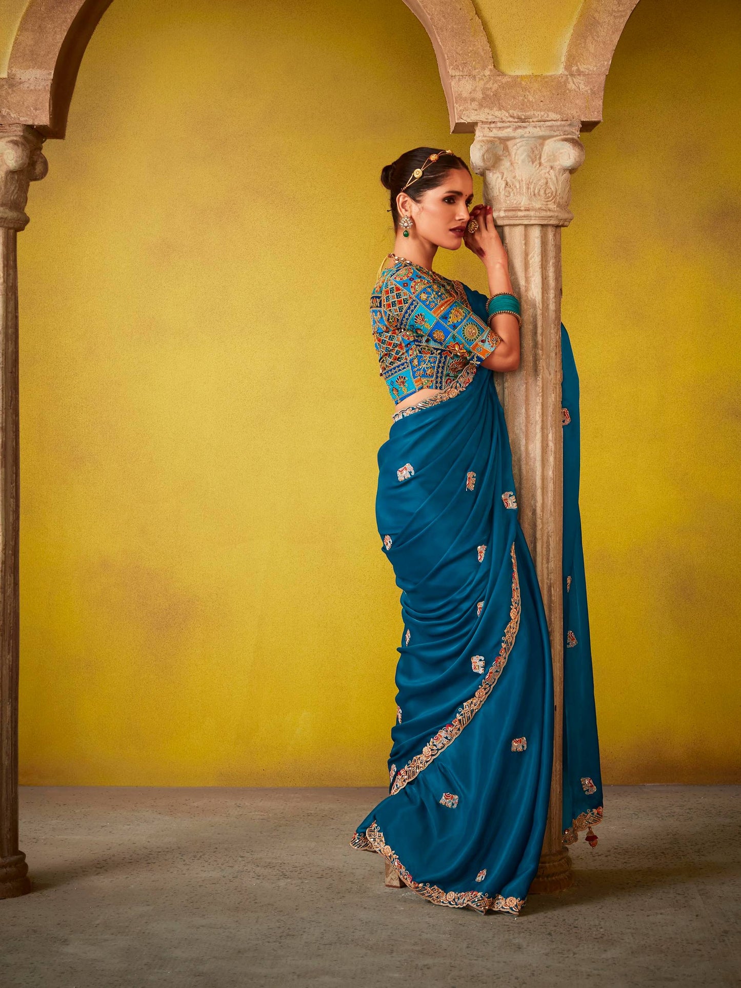Dhiyona KM Women Regal Blue Saree With Intricately Embroidered Blouse