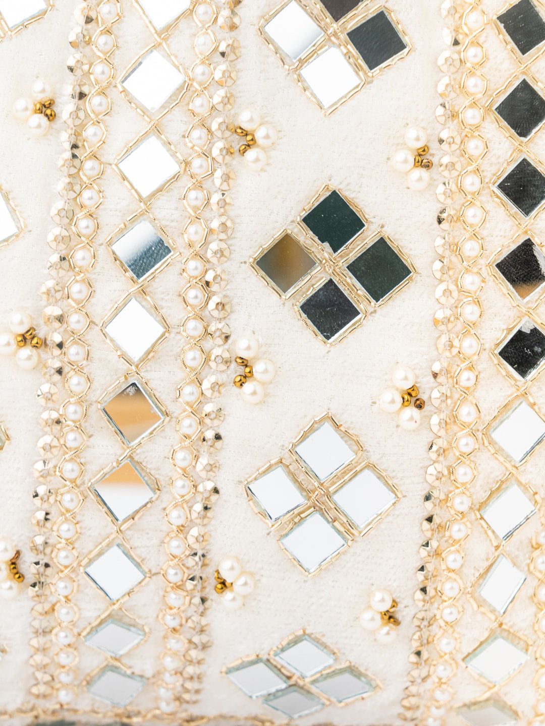 Dhiyona NR White & Gold-Toned Embroidered Embellished Potli Clutch