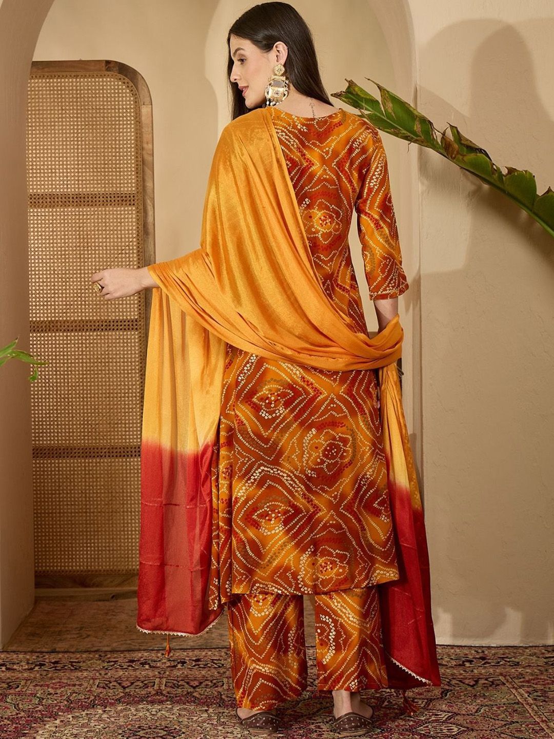 Dhiyona SN Women's Bandhani Printed Sequinned A-Line Kurta With Trousers & Dupatta