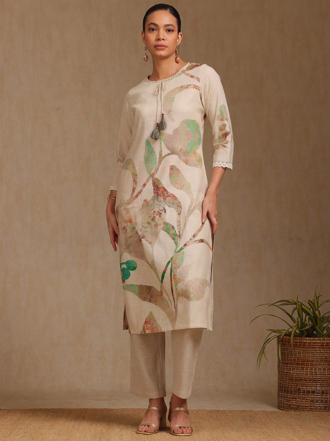 Dhiyona SO Women's Women Floral Embroidered Regular Kurta with Trousers