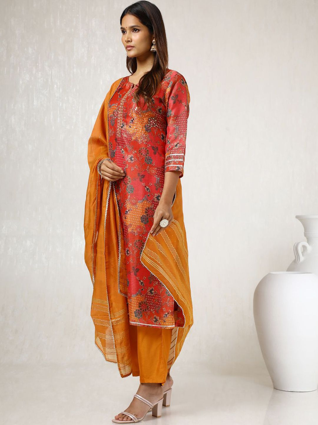 Dhiyona SO Women's Orange Floral Printed Round Neck Regular Sequinned Tissue Kurta & Trouser & Dupatta