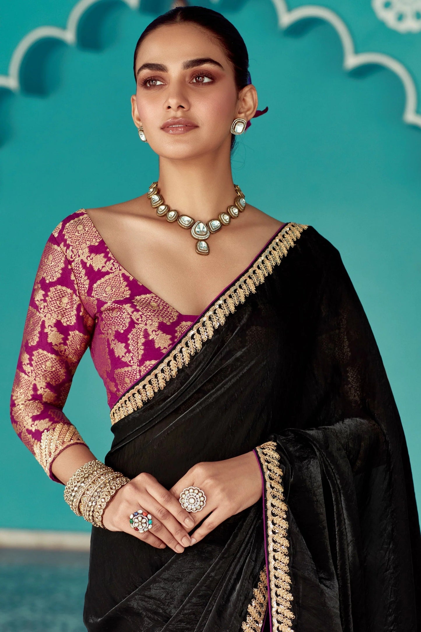 Dhiyona KM Women Black Tissue Silk Saree With Golden Border & Purple Blouse