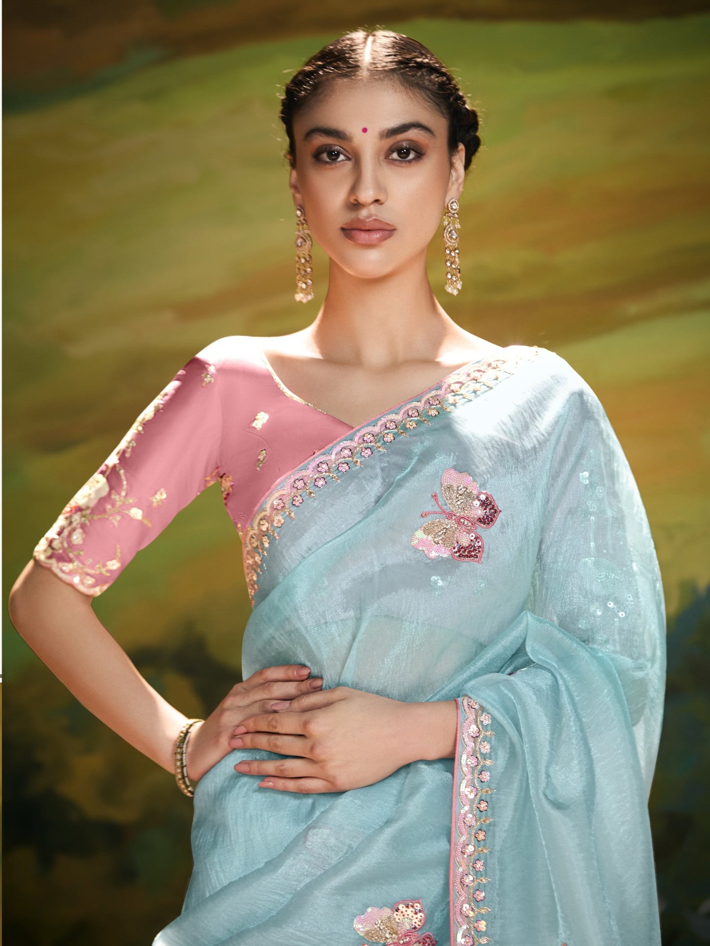 Dhiyona KM Women Aqua Blue Saree With Red Blouse