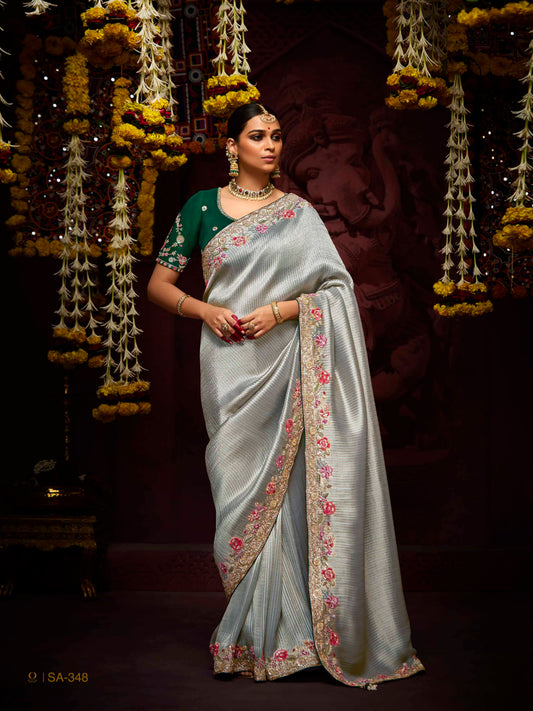 Dhiyona KM Women Elegant Silver Grey Banarasi Silk Saree With Red-Pink Floral Thread & Sequin Work