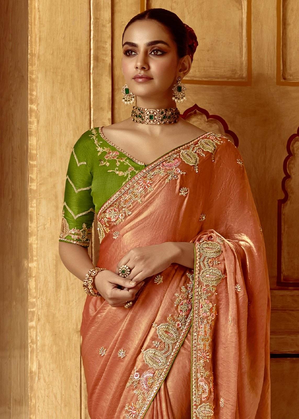 Dhiyona KM Women Peach Designer Tissue Silk Saree With Green Blouse