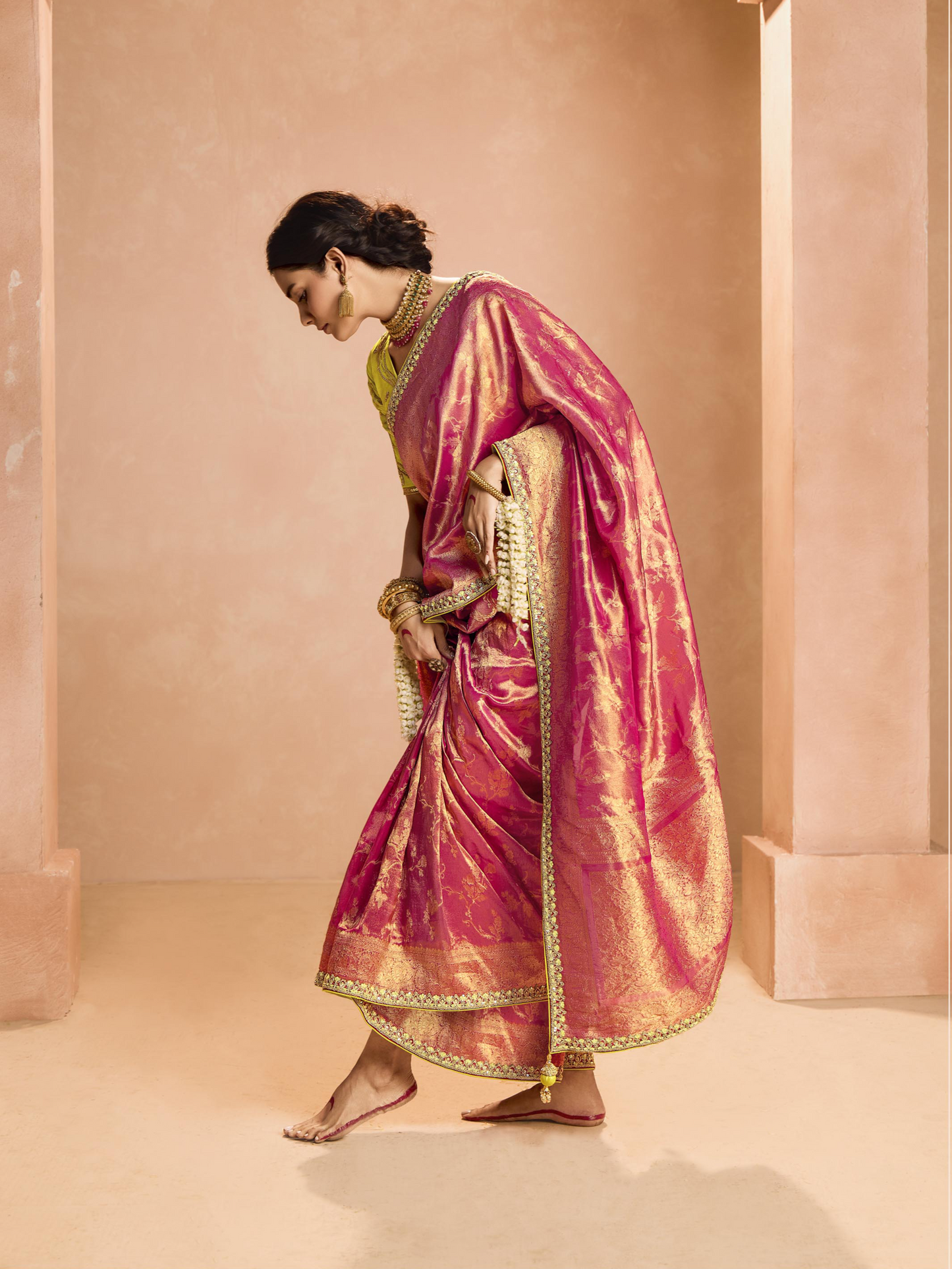 Dhiyona KM Women Red Kanjivaram Silk Saree With Lime Green Embroidered Blouse