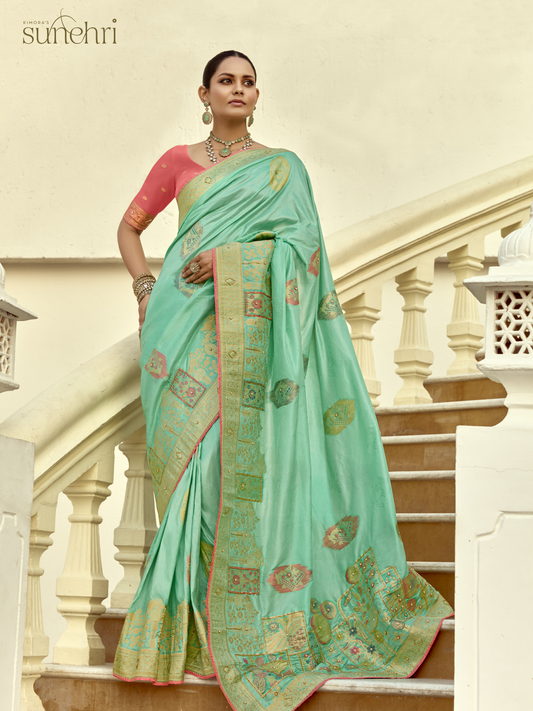 Dhiyona KM Women Mint Green Banarasi Silk Saree With Red Blouse