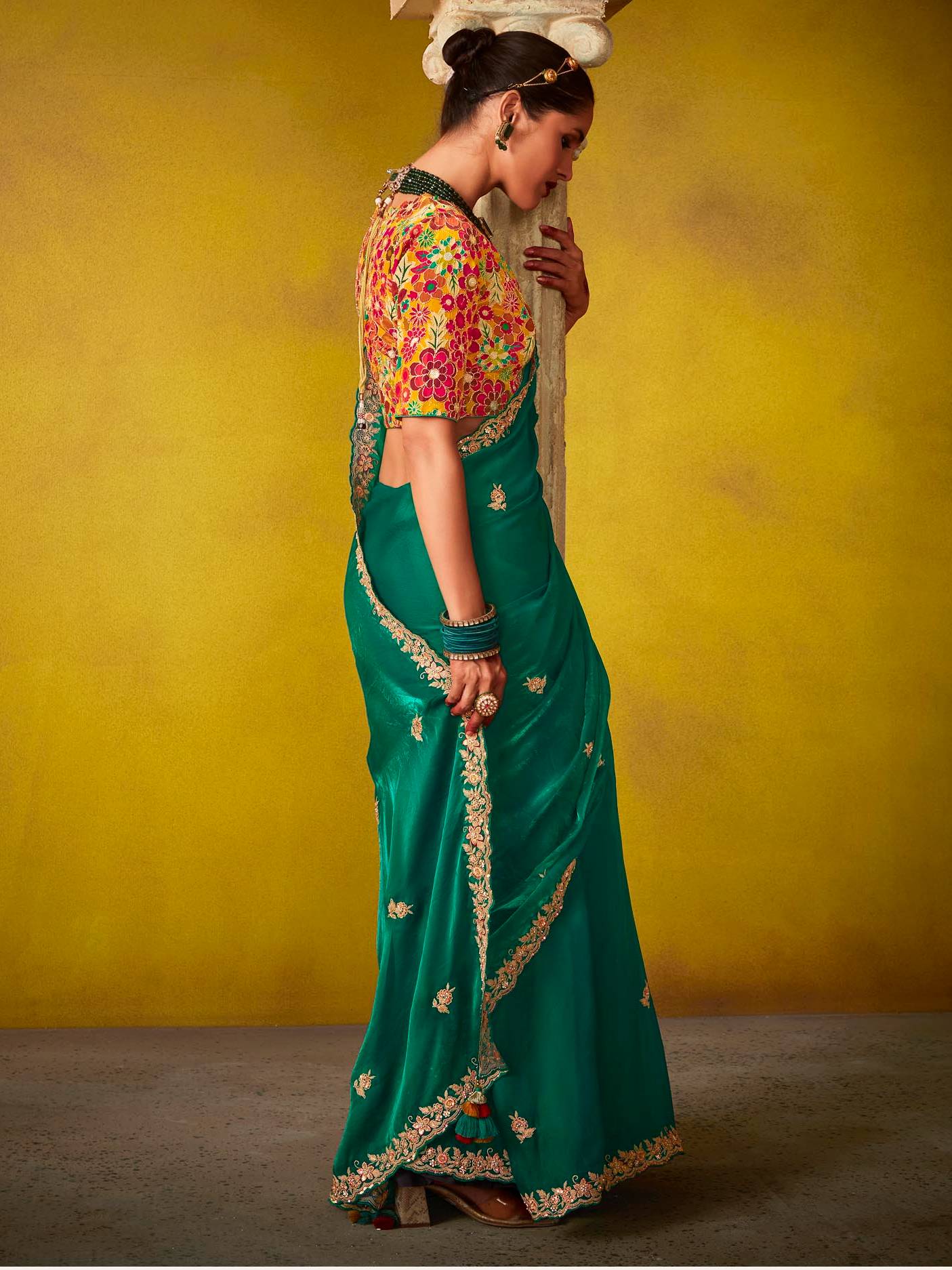 Dhiyona KM Women Emerald Green Saree With A Vibrant Floral Embroidered Blouse