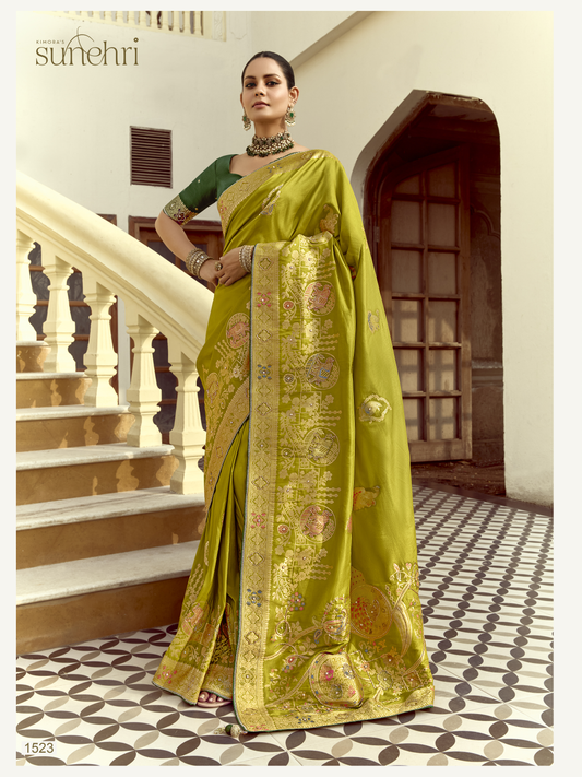 Dhiyona KM Women Sea Green Saree With Banarasi Work And Dark Green Blouse