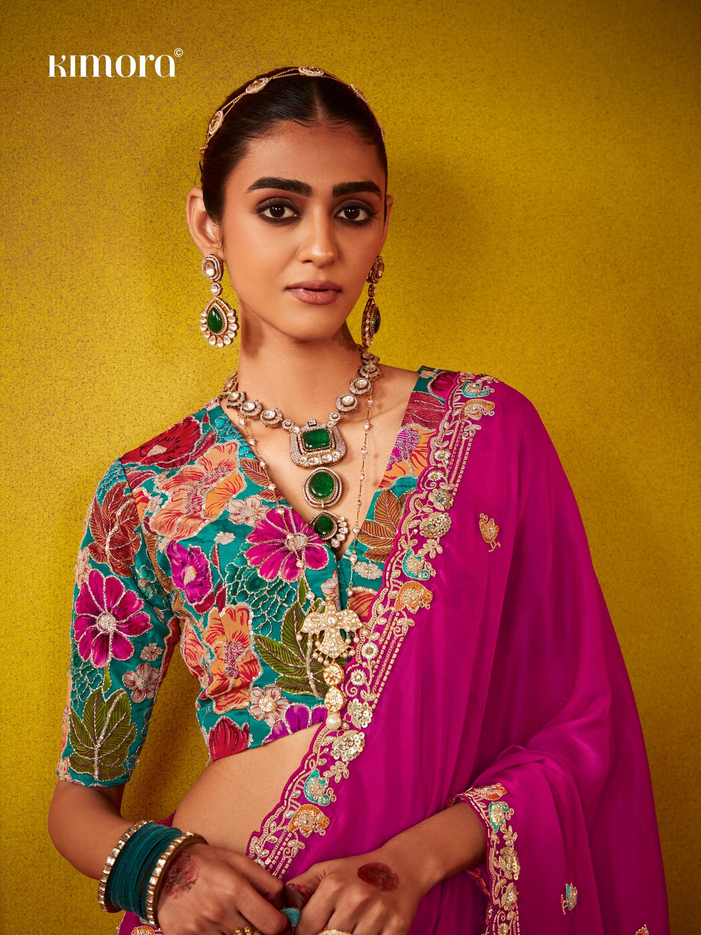 Dhiyona KM Women Regal Magenta Elegance: A Timeless Saree Of Opulence