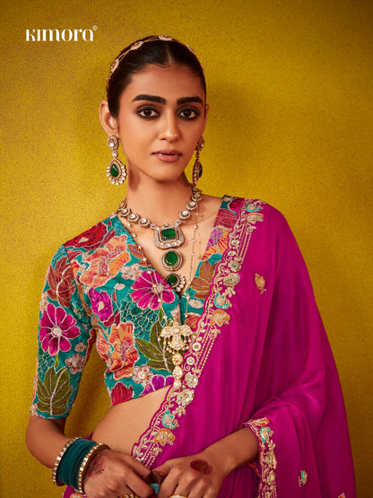 Dhiyona KM Women Regal Magenta Elegance: A Timeless Saree Of Opulence
