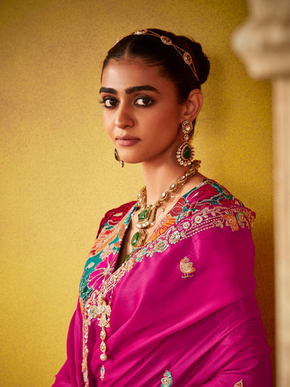 Dhiyona KM Women Regal Magenta Elegance: A Timeless Saree Of Opulence