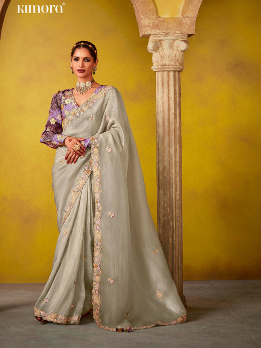 Dhiyona KM Women Elegant Silver Saree With Ornate Blouse