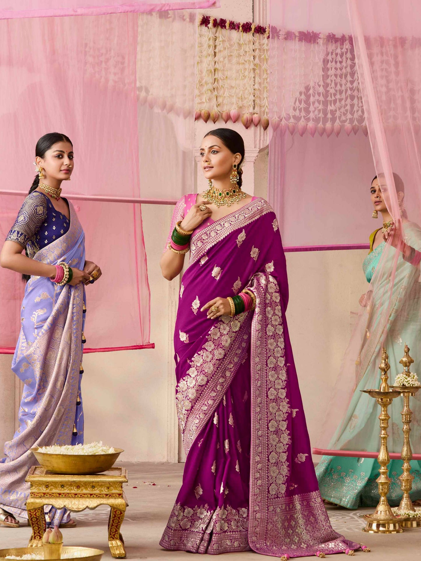 Dhiyona KM Women Purple Dola Silk Saree With Pink Golden Embroidered Blouse