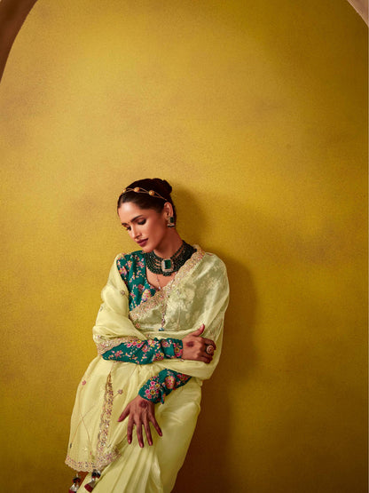 Dhiyona KM Women Lemon Yellow Saree With Embroidered Teal Blouse