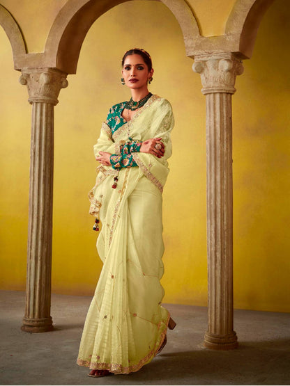 Dhiyona KM Women Lemon Yellow Saree With Embroidered Teal Blouse