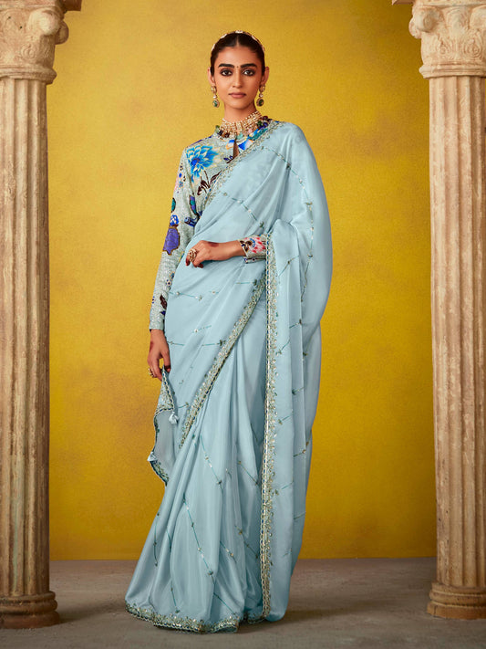 Dhiyona KM Women Ethereal Elegance: Blue Silk Saree With Embroidered Blouse