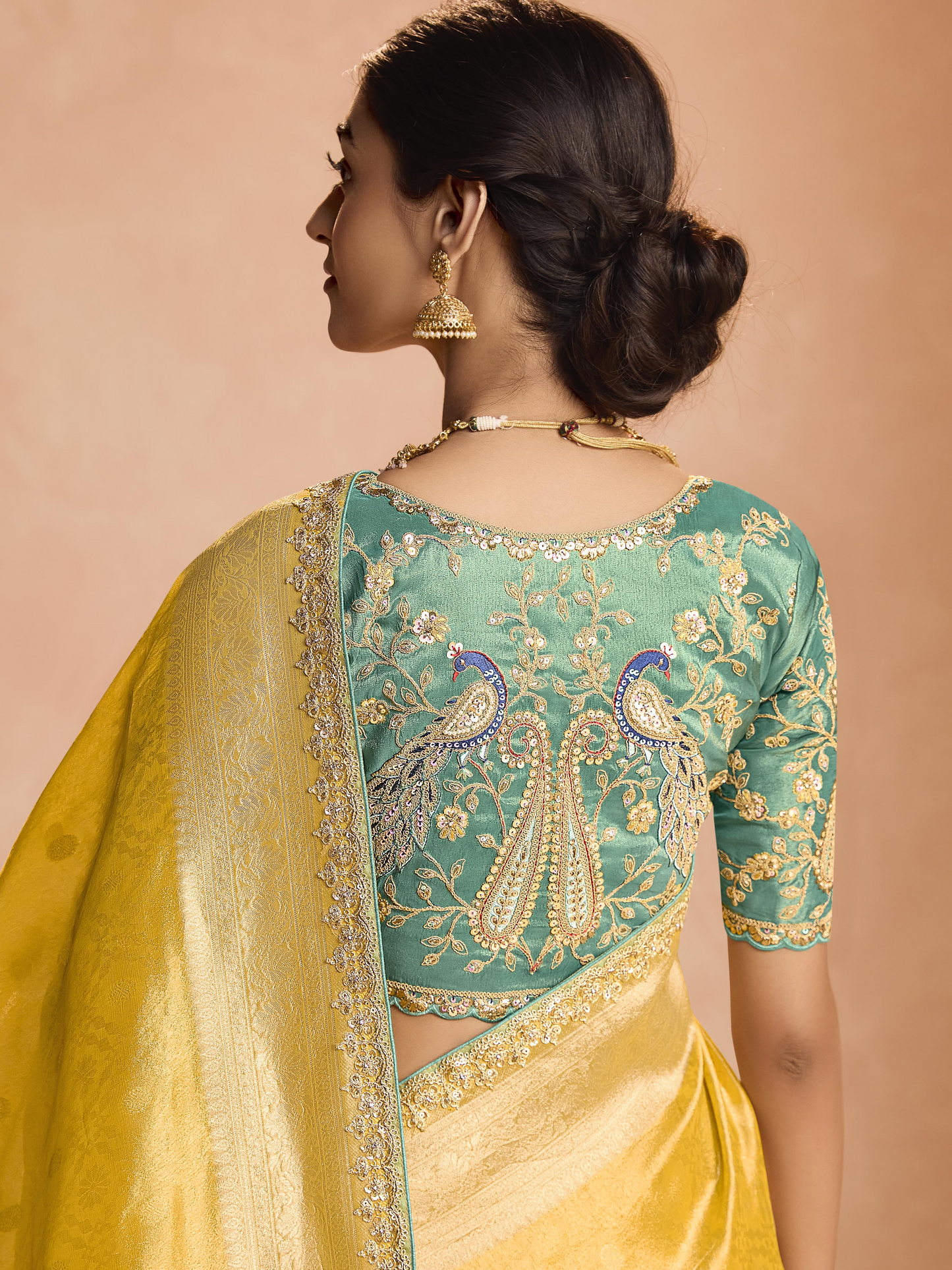 Dhiyona KM Women Yellow Kanjivaram Silk Saree With Sea Green Embroidered Blouse