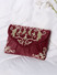 Dhiyona NR Women Maroon And Gold Toned Embroidered And Sequins Embellished Clutches