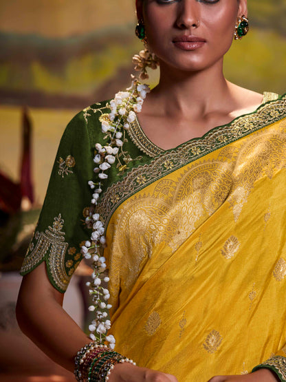 Dhiyona KM Women Yellow Pure Dola Silk Saree With Contrasting Green Embroidered Blousee
