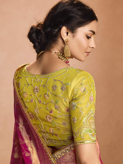 Dhiyona KM Women Red Kanjivaram Silk Saree With Lime Green Embroidered Blouse