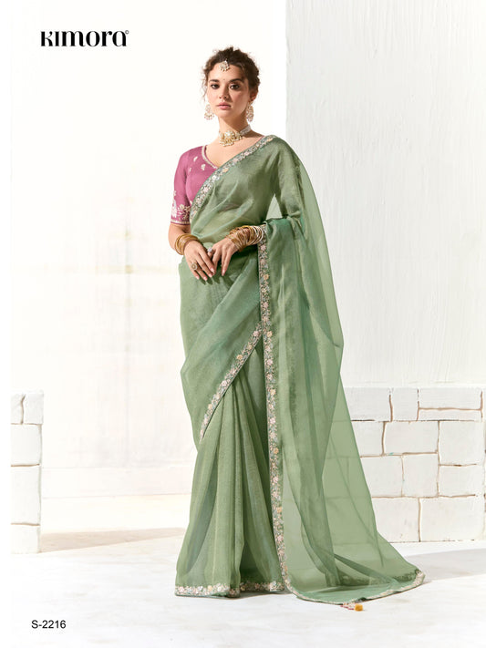 Dhiyona KM Women Mint Green Shimmer Saree With Ornate Mauve Purple Embroidered Blouse