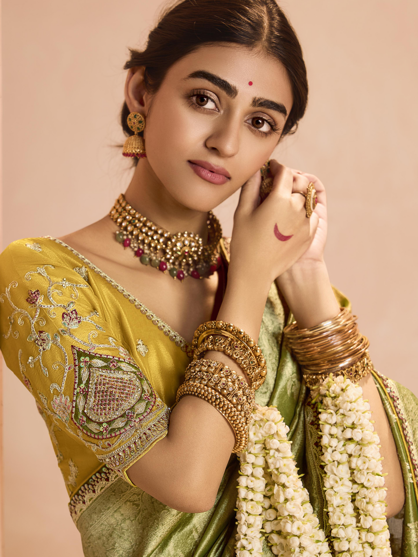 Dhiyona KM Women Radiant Green Kanjivaram Silk Saree With Ornate Yellow Blouse “ A Regal Ensemble