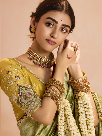 Dhiyona KM Women Radiant Green Kanjivaram Silk Saree With Ornate Yellow Blouse “ A Regal Ensemble