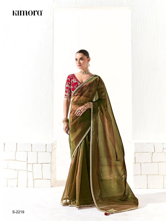 Dhiyona KM Women Mahendi Green Tissue Silk Saree With Red Blouse “ Inspired By Tradition & Bold Elegancemahendi Green Tissue Silk Saree With Red Blouse