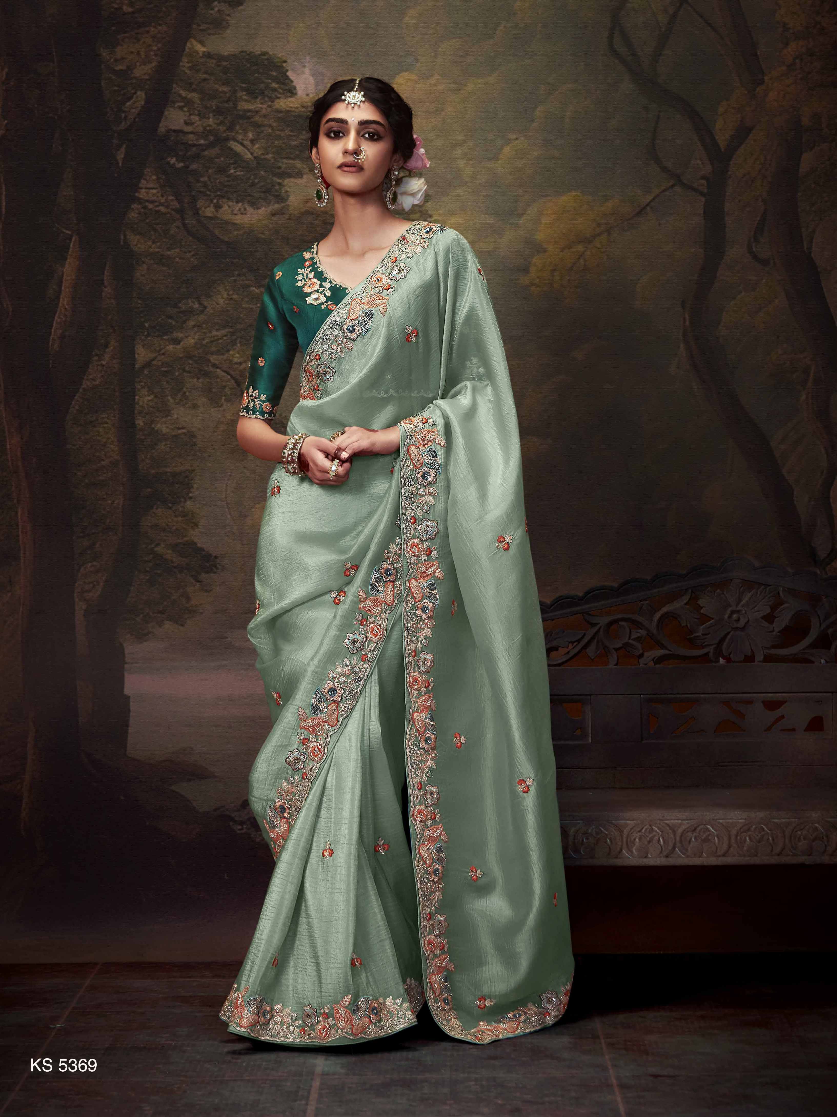 Dhiyona KM Women Regal Sea Green Tissue Silk Saree With Intricately Embroidered Bottle Green Blouse